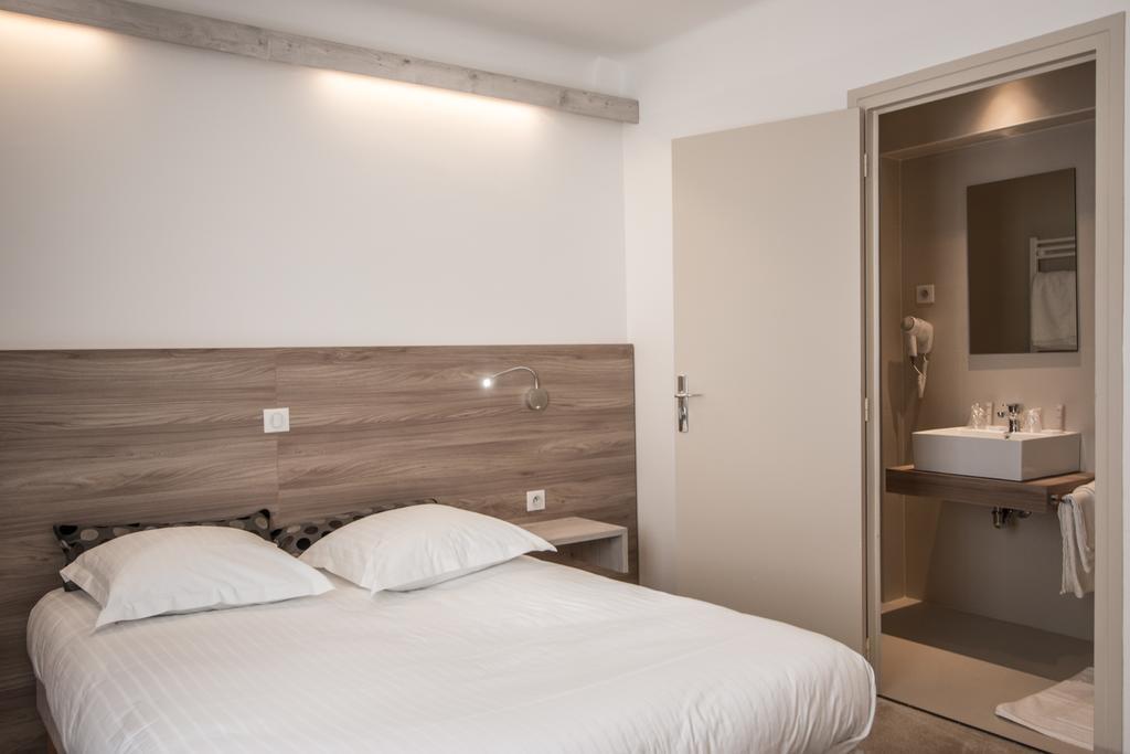Hotel Les Voyageurs Модан Номер фото