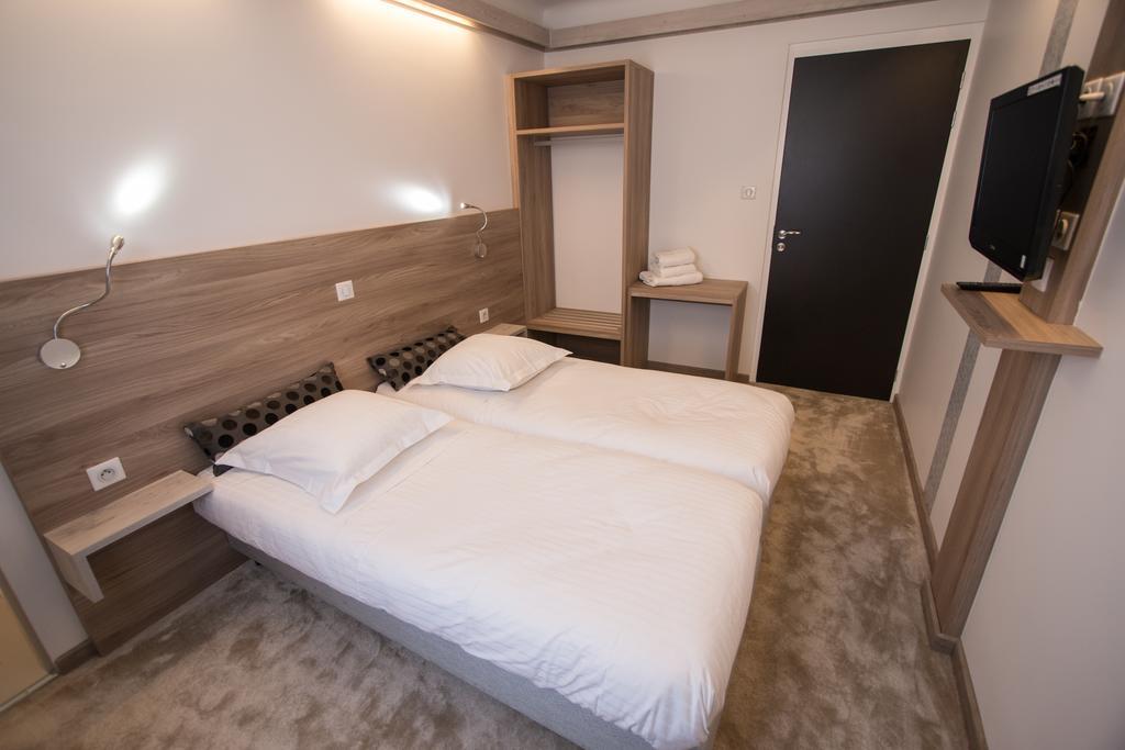Hotel Les Voyageurs Модан Номер фото