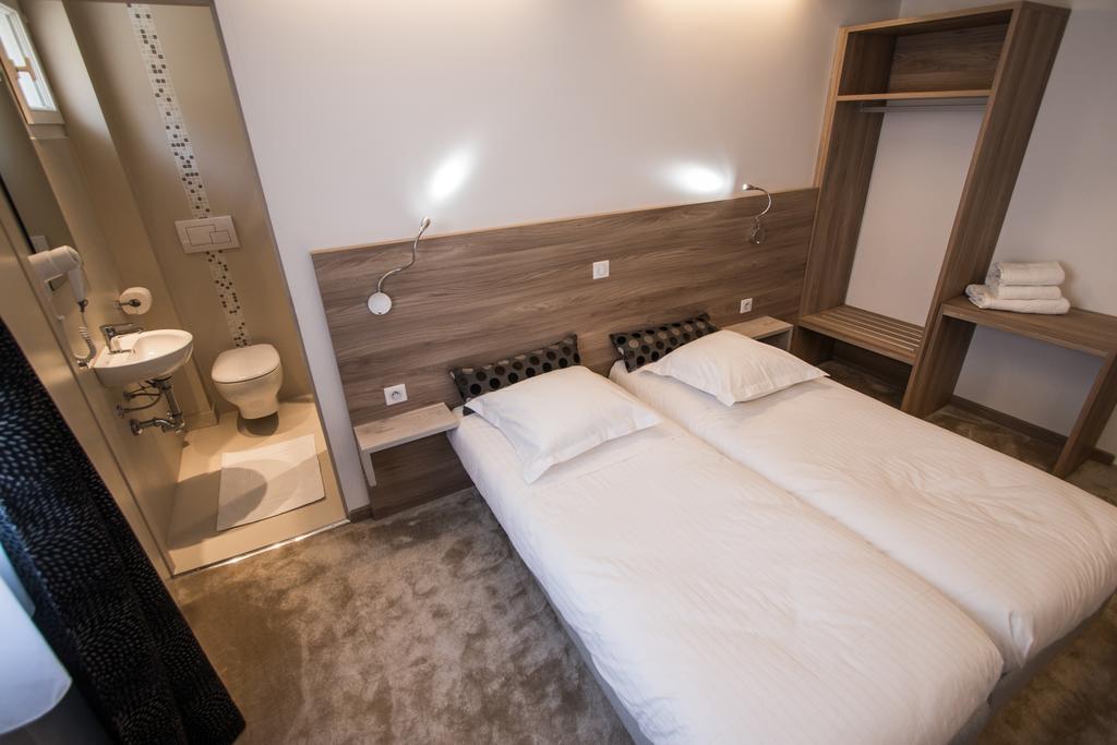 Hotel Les Voyageurs Модан Номер фото