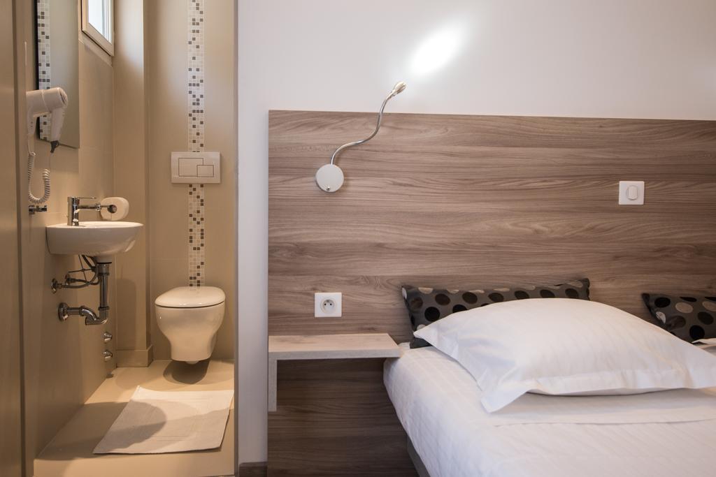 Hotel Les Voyageurs Модан Номер фото