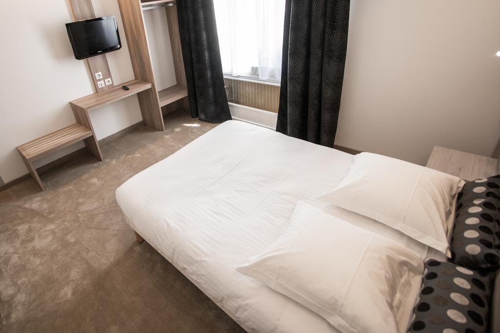 Hotel Les Voyageurs Модан Номер фото