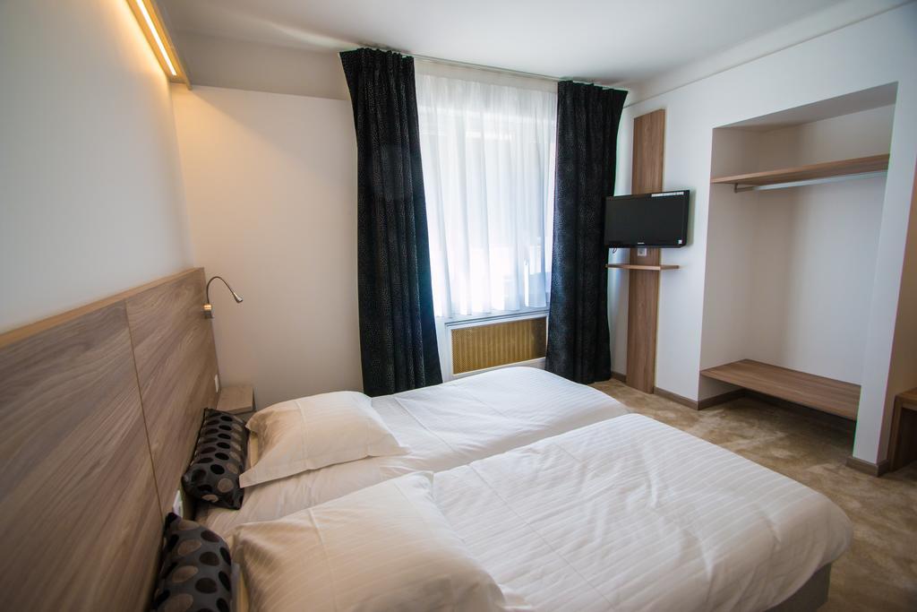 Hotel Les Voyageurs Модан Номер фото