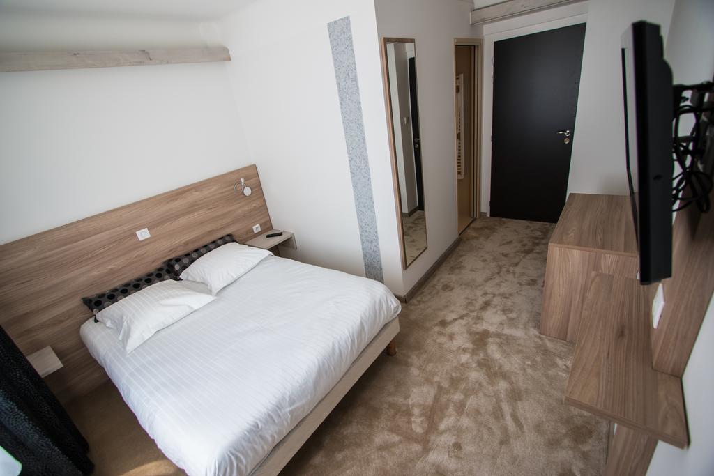 Hotel Les Voyageurs Модан Номер фото